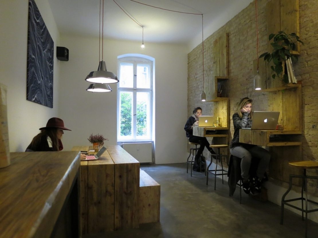 People using laptops in a coffee shop